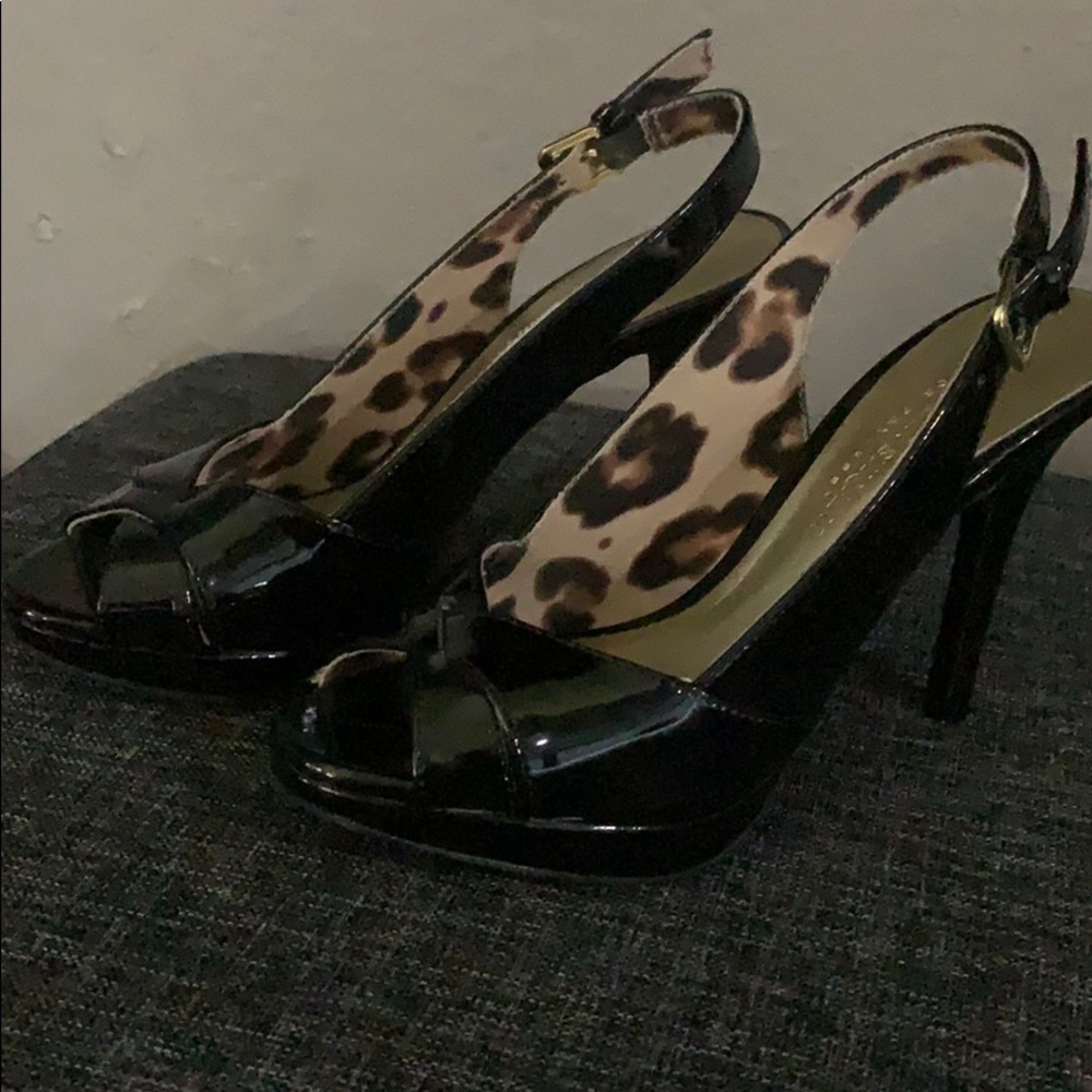 Black patent sling-back heels